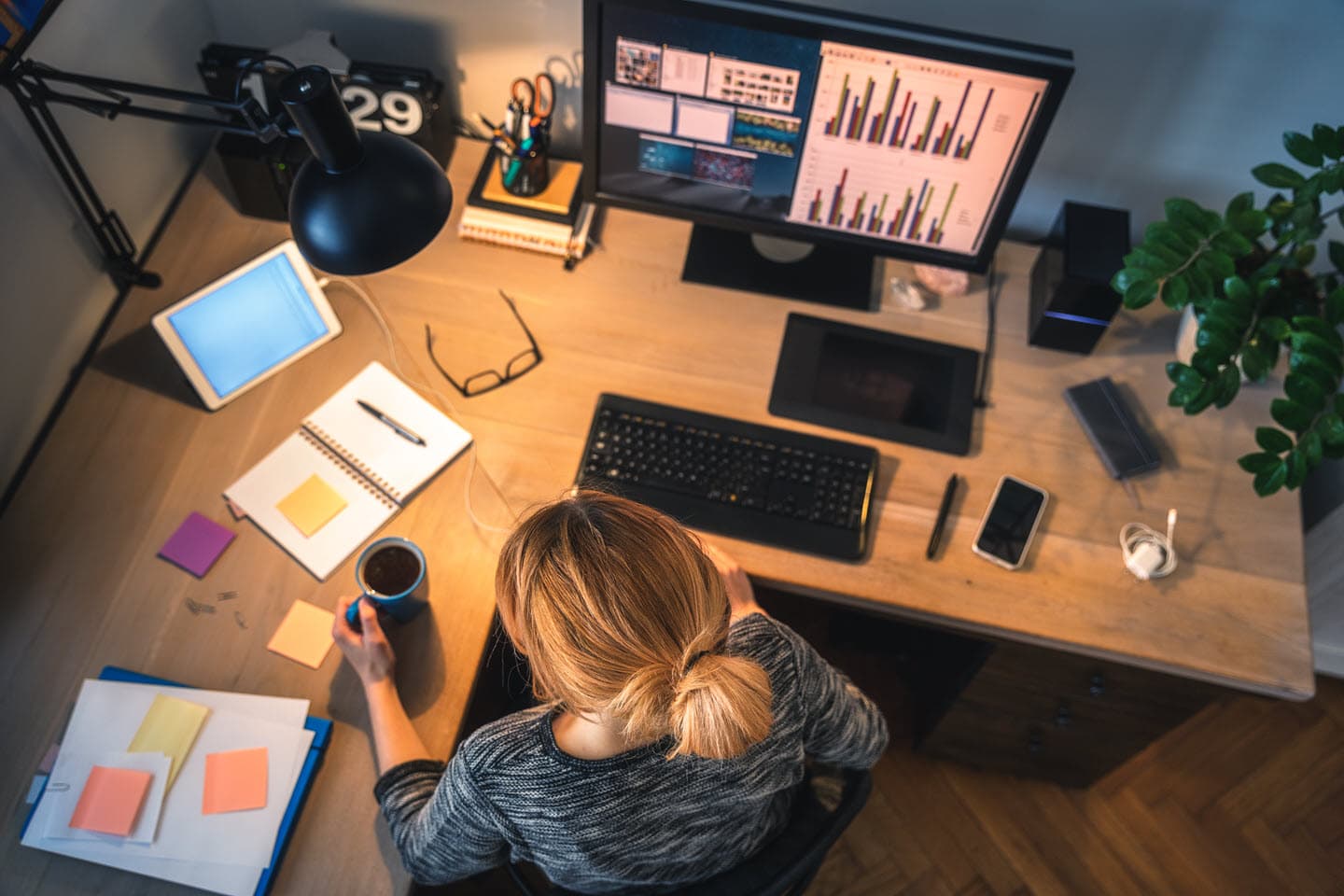 Home office desk with laptop, representing home IT support services